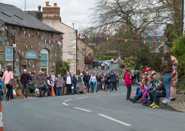 Scorton Bikes and Barrows procession through the village.