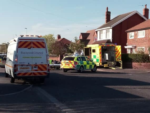 The scene on Common Edge Road after a motorcyclist was injured in a collision