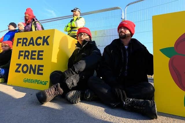 Volunteer campaigners, from areas facing fracking across the UK, block the entrance to the Preston New Road fracking site in Lancashire
Pic: Greenpeace