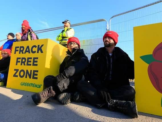 Volunteer campaigners, from areas facing fracking across the UK, block the entrance to the Preston New Road fracking site in Lancashire
Pic: Greenpeace
