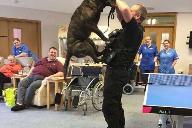 PC Pete Crowther from the Lancashire Police Dog Unit took Daisy and Zeus on a special afternoon visit to day care patients at Trinity Hospice.