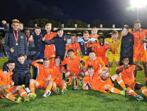 Blackpool celebrating their cup win at Gigg Lane last month