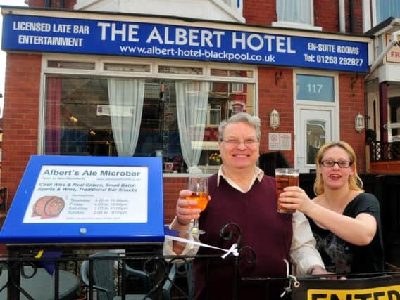 George Forrest and Jennie Ransome of the Albert Hotel, Albert Road, Blackpool, with cider and a pint from the microbar which they have opened to the public in the hotel.