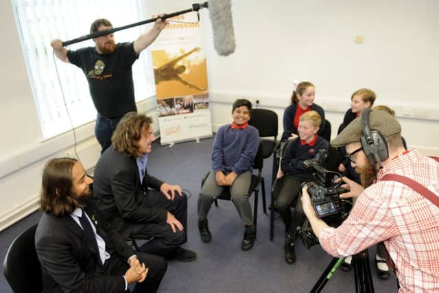 Pupils from St John's Primary interview Arif Rajpura and Secret Millionaire David Jamilly