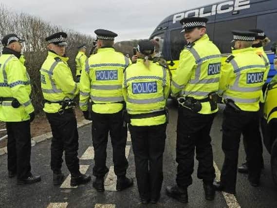 Police at the Preston New Road site