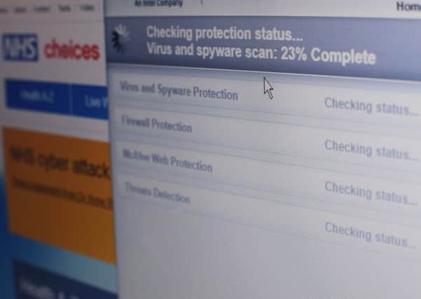 Internet security software performing an anti-virus and anti-spyware scan on a laptop, after the NHS has been hit by a major cyber attack on its computer systems (Pic: Yui Mok/PA Wire)