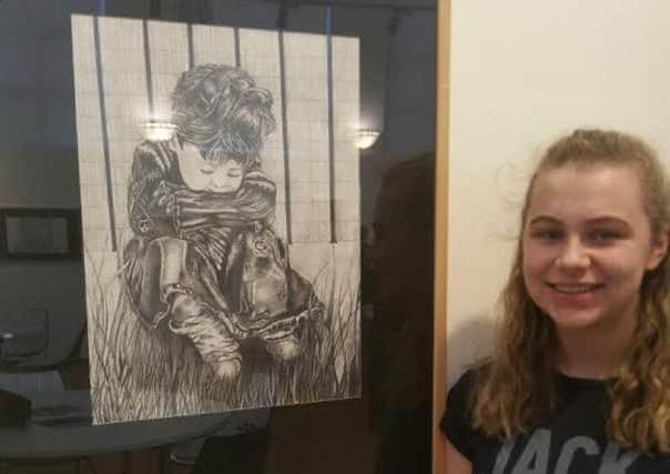 Young artist of the year Kelsey Lester, 15, and her winning artwork