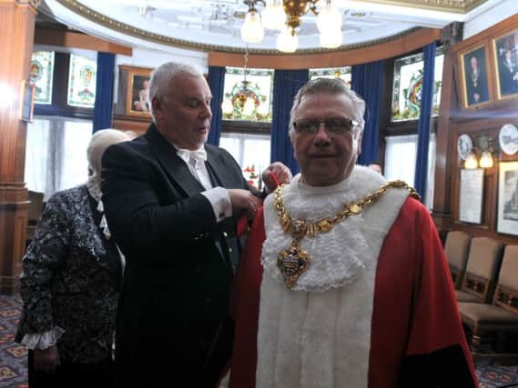 Coun Ian Coleman is given his chains of office