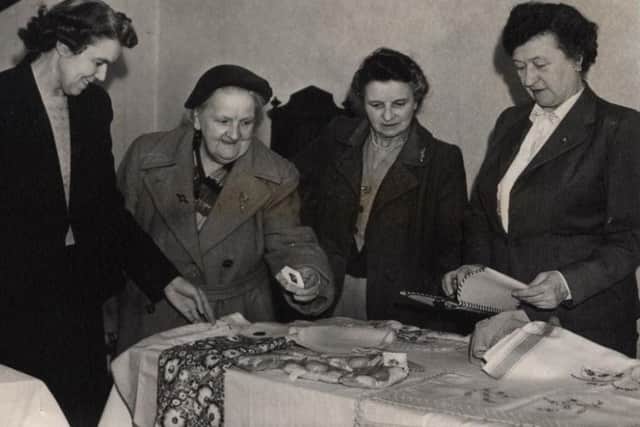 A spring fair held by St Annes British Legion at their headquarters at Mayfield Road, in May 1956.
 From left - Miss G Evans (hon Sec), Mrs S J Westhead (chairman), Mrs E Jones (vice chairman), Miss A Slater (hon treasurer)