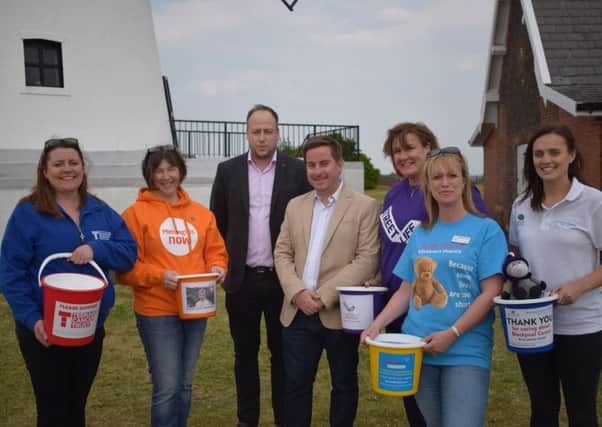 Lytham Festival directors Daniel Cuffe and Peter Taylor with charity representatives (from left):  Michelle White (Teenage Cancer Trust), Liz Dee (Meningitis Now), Jane Hugo (Streetlife), Michelle Lonican (Brian House) and Sian Howarth (Blackpool Carers)