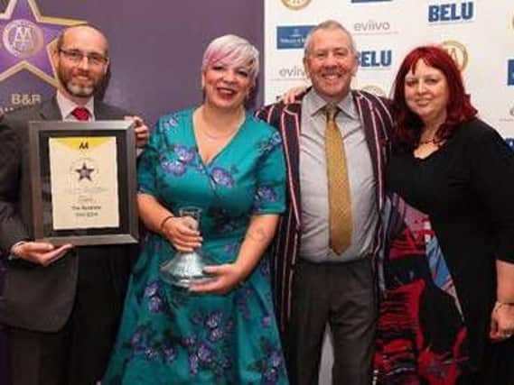 Fylde coast B&B The Bromley was a finalist in the AA Friendliest B&B Award, sponsored by eviivo for 2017. Pictured are  Ian Hardwick from eviivo, Nix and Mick Thompson from The Bromley and Giovanna Grossi, AA Hotel Services