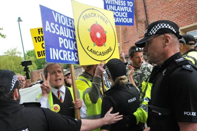 Protesters face police at Kirkham Police Station