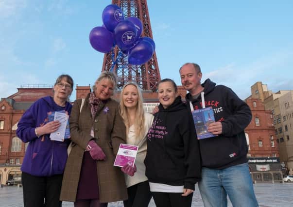 group from the Fibro Flair Awareness Group - a charity to raise awareness into fibromyalgia - who have arranged to have the tower to be lit up. L-R Cath Farrer, Sarah Roberts, Lucy Roberts, Helen Sharpe and Richard McCourts.