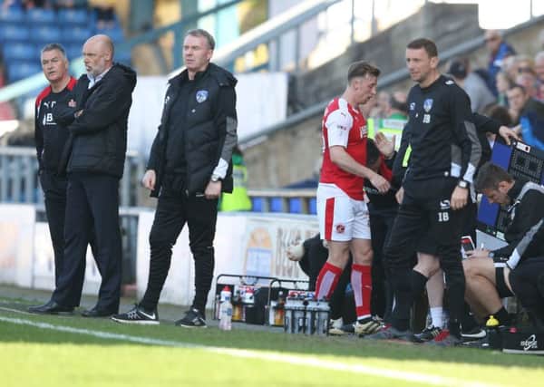 Martyn Woolford leaves the pitch at Oldham