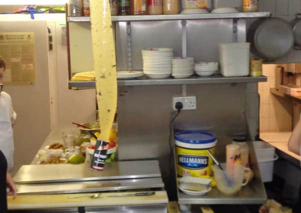 Inspectors found fly paper hanging above food