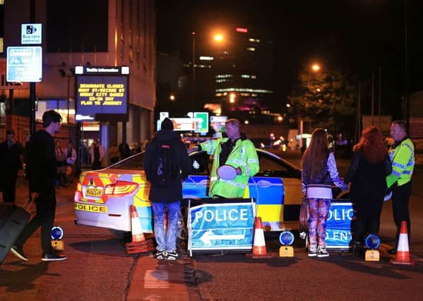 Emergency services at Manchester Arena after reports of an explosion at the venue during an Ariana Grande gig (Pic: Peter Byrne/PA Wire)