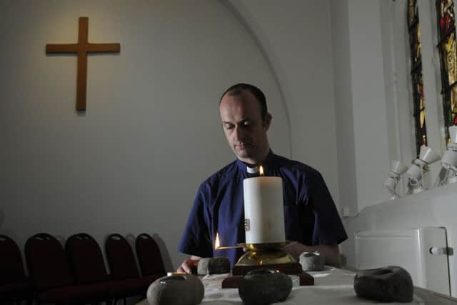 The Rev Steve Haskett holds a vigil for members of the public at Blackpool's St John's Church