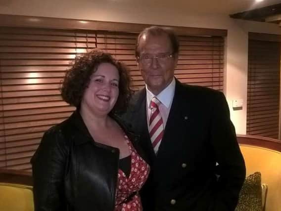 Anna Cryer with Roger Moore