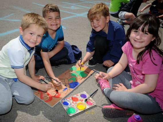 Pupils at Stanah Primary School were painting and digging today as part of a project to brighten up their outdoor spaces.
Painting a wall plaque are Harvey, Jack, Noah and Chloe