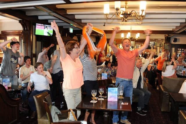 With only 5000 or so fans heading to Wembley for Blackpool's play-off final against Exeter, hundreds of supporters packed the Boar's Head pub in Marton to watch the game on TV.
The whistle goes and Blackpool are back in League One.  PIC BY ROB LOCK
28-5-2017