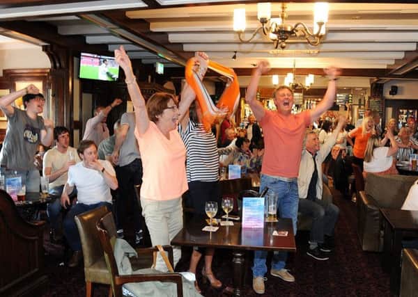 With only 5000 or so fans heading to Wembley for Blackpool's play-off final against Exeter, hundreds of supporters packed the Boar's Head pub in Marton to watch the game on TV.
The whistle goes and Blackpool are back in League One.  PIC BY ROB LOCK
28-5-2017
