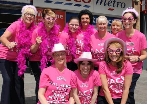 Over 100 members of Tesco's staff from across the Fylde coast will be taking part in the Race for Life on Blackpool promenade in July.
Team members from Tesco's in Cleveleys limber up.  PIC BY ROB LOCK
25-5-2017