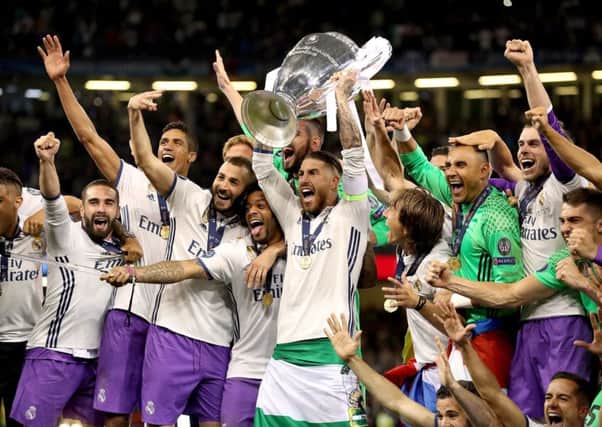 Real Madrid celebrate after beating Juventus 4-1 in Cardiff