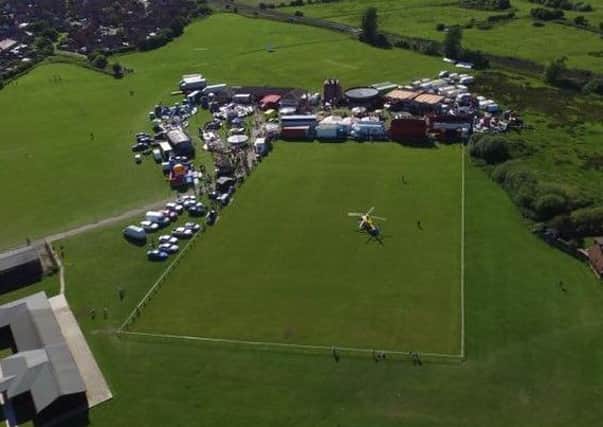 The air ambulance landing at Cottam Hall playing fields in Poulton on Sunday evening (Pic: Ben Ward)