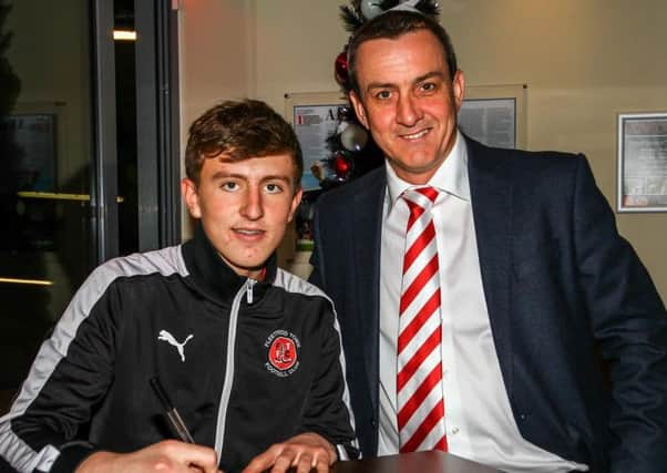 Young academy keeper Billy Crellin with chairman Andy Pilley
