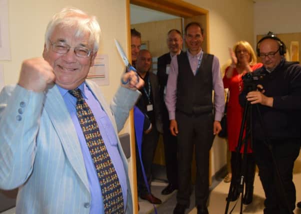 Professor Kevin Webb, from Manchester Adult CF Centre at University Hospitals of South Manchester, cutting the ribbon at the launch event