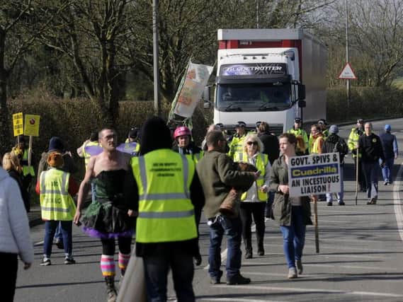 A road has been partially blocked by anti-fracking protesters