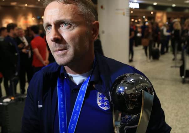 Paul Simpson returns home with the Under-20s World Cup