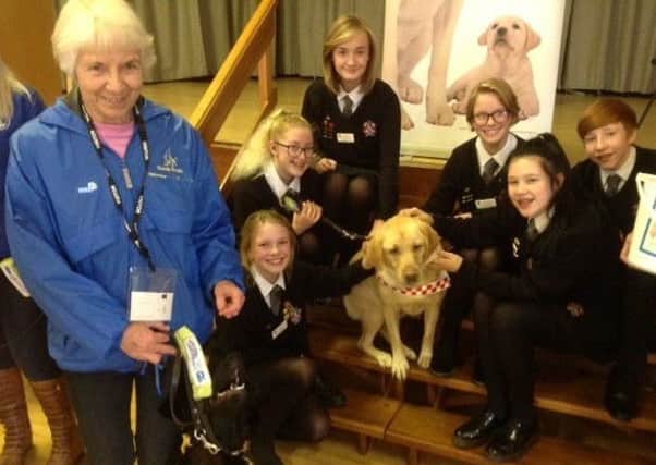 Students from Saint Aidan's High School have been fundraising for Guide Dogs for the Blind