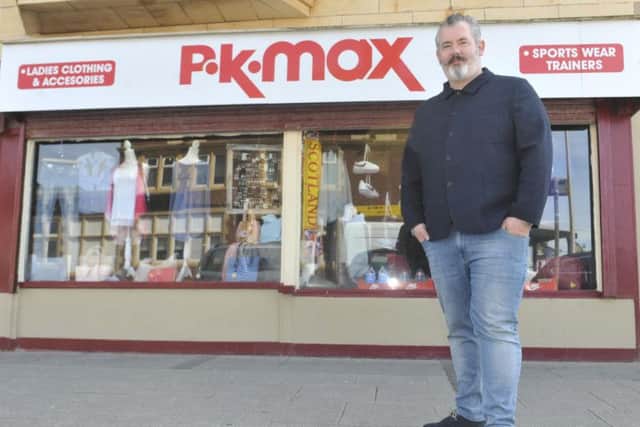 Retail giant T K Maxx has said the name of Mark Yates' store, P K Max, is too similar. Credit: SWNS
