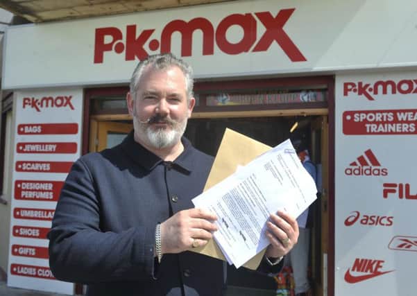 Mark Brooks with the legal letter from TK Maxx