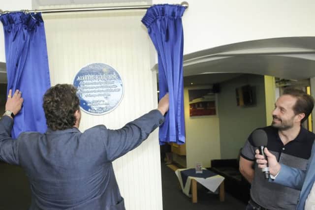 A blue plaque dedicated to Alfie Boe is unveiled by Michael Ball at Marine Hall in Fleetwood