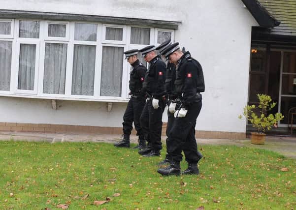 Police at the vicarage in Freckleton during the police investigation