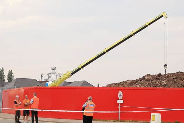 Emergency services at the scene where a crane collapsed in Dunwoody Way in Crewe