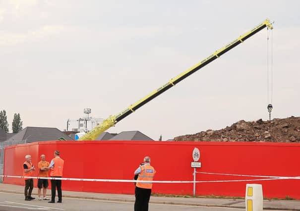 Emergency services at the scene where a crane collapsed in Dunwoody Way in Crewe