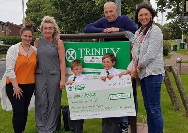 A fund-raiser in memory of Fleetwood mum Paula Young raised Â£3,330 for Trinity Hospice. From left: Stacie Nicklin, Maxine  Emslie, Oscar Wright, Jayden Nicklin, Colin Young and  Lisa Haugan.