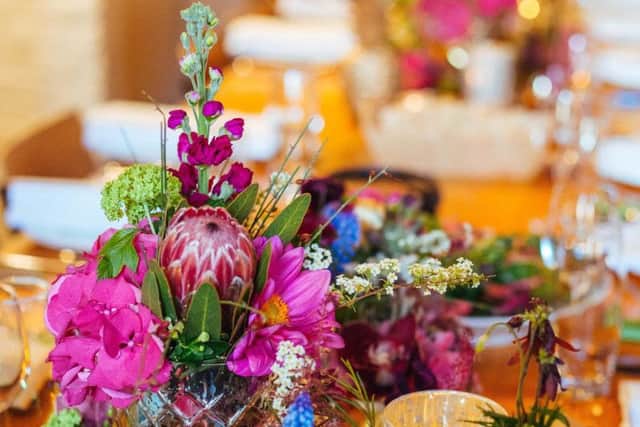 Stunning flowers by Flower Design Events at the wedding of Wolf and Jennifer Zech