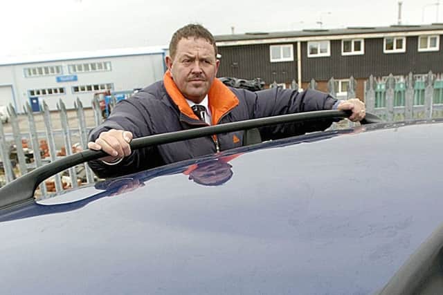 Vandalism at Lawtons of Fleetwood.Chris Spencer with a damaged car roof