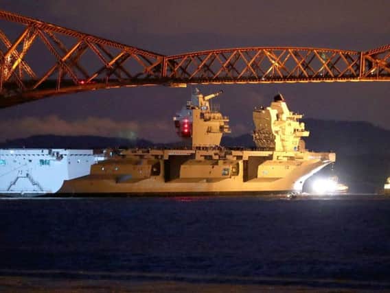 HMS Queen Elizabeth sets out from Rosyth for sea trials