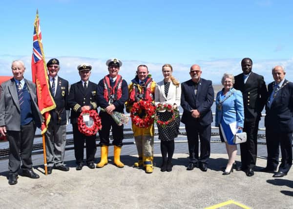 Representatives of naval associations, the Fishermen's Mission and Fleetwood Town Council join MP Cat Smith on Sea Sunday.