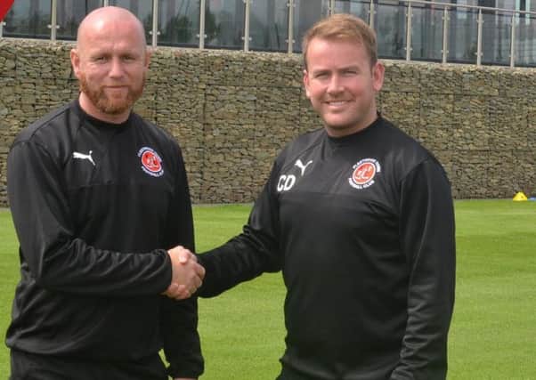 Stephen Crainey shakes hands with Fleetwood's academy manager Ciaran Donnelly. Photo credit: Fleetwood Town FC
