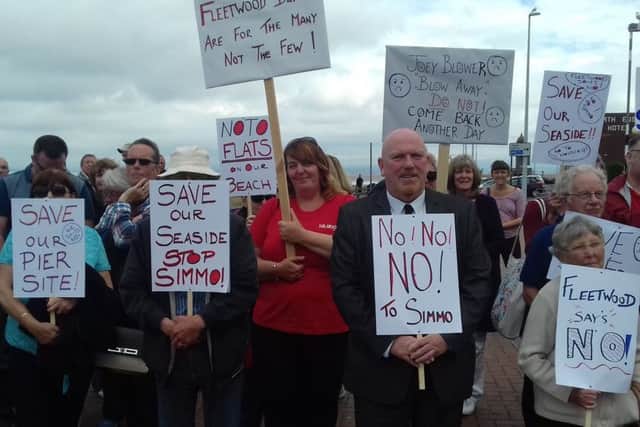 Objectors to the flats on Fleetwood Pier make their point during a silent protest.
