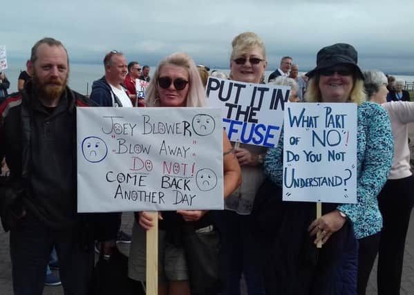 Protesters make point against plans for flats on Fleetwood Pier site.