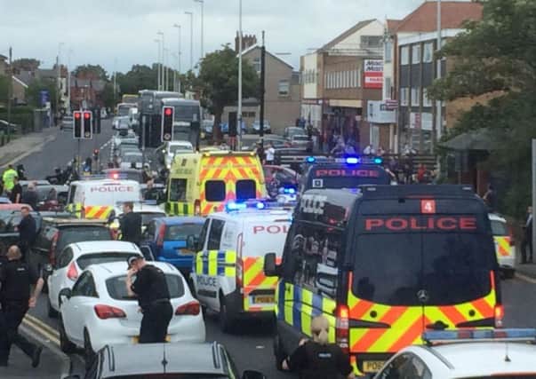 Police on the scene as a large group of bikers bring Devonshire Road in Blackpool to a halt.