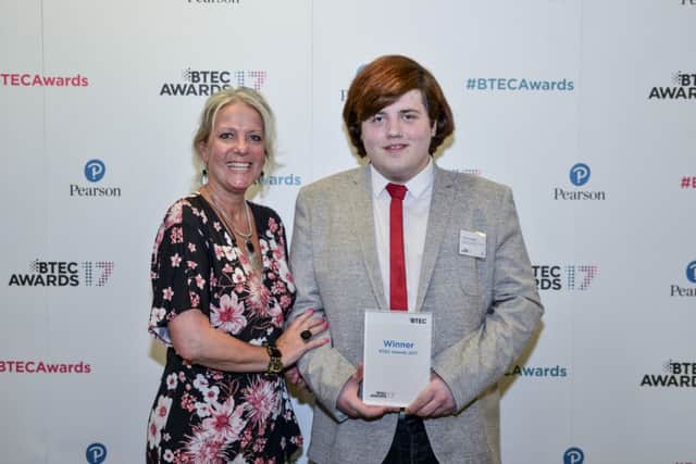 Lewis Dugdale from St Annes is congratulated on his national BTEC award by  Jo Catlow-Morris, programme leader in performing arts and art and design at Lythan Sixth Form College