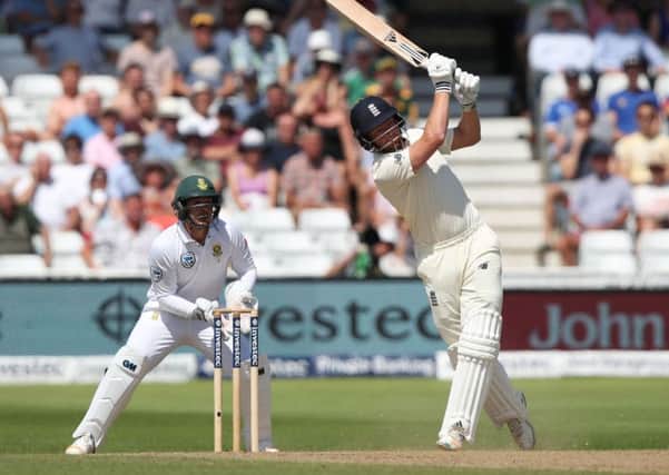 England's Jonny Bairstow mistimes a shot and is caught out by South Africa's Chris Morris off the bowling of Keshav Maharaj
